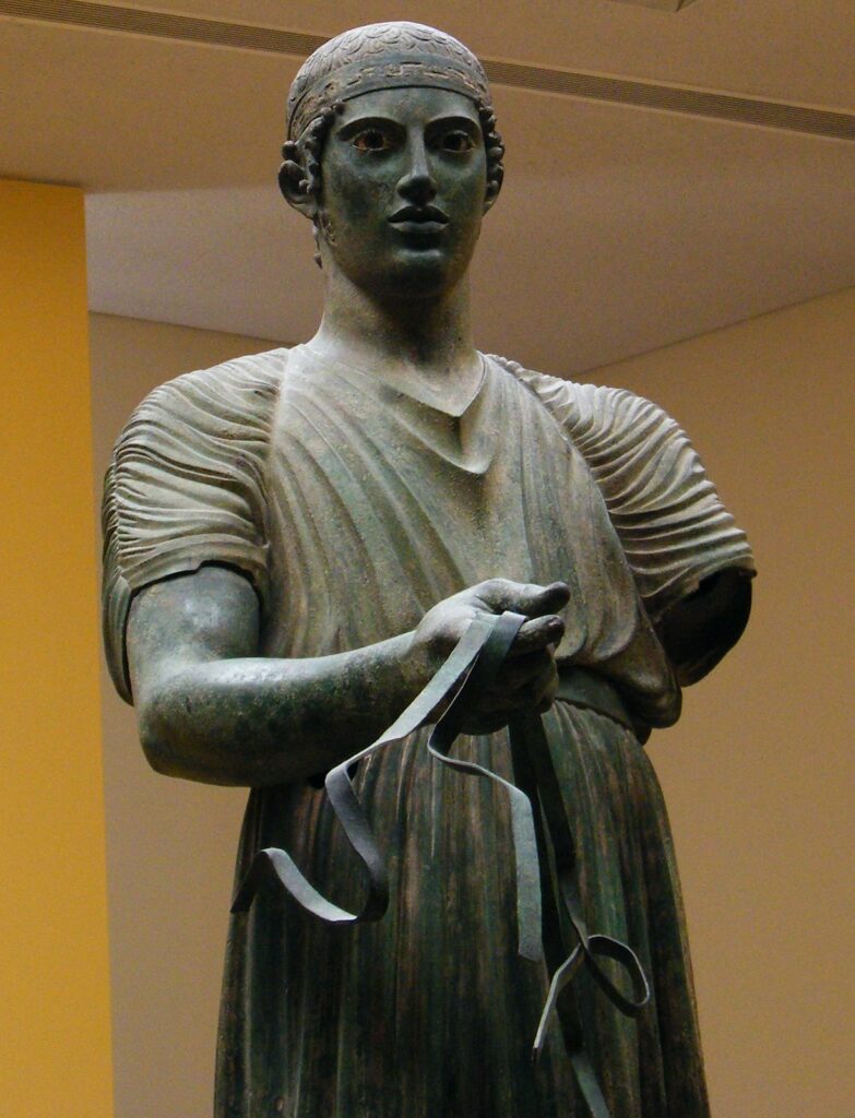 Auriga de Delfos 470 a. C. Símbolo de autocontrol.